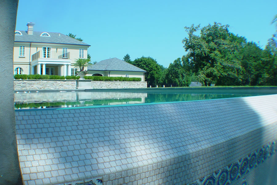 Contemporary Outdoor Pool Rumson, New Jersey with Negative Edge  Residential Pool Design by Omega Pool Structures, Inc